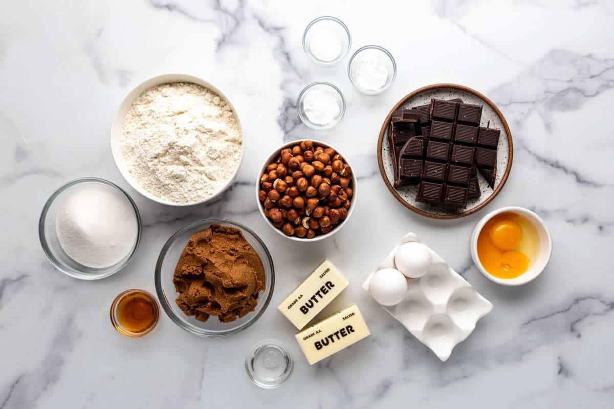 Ingredients for making brown butter hazelnut chunk cookies.