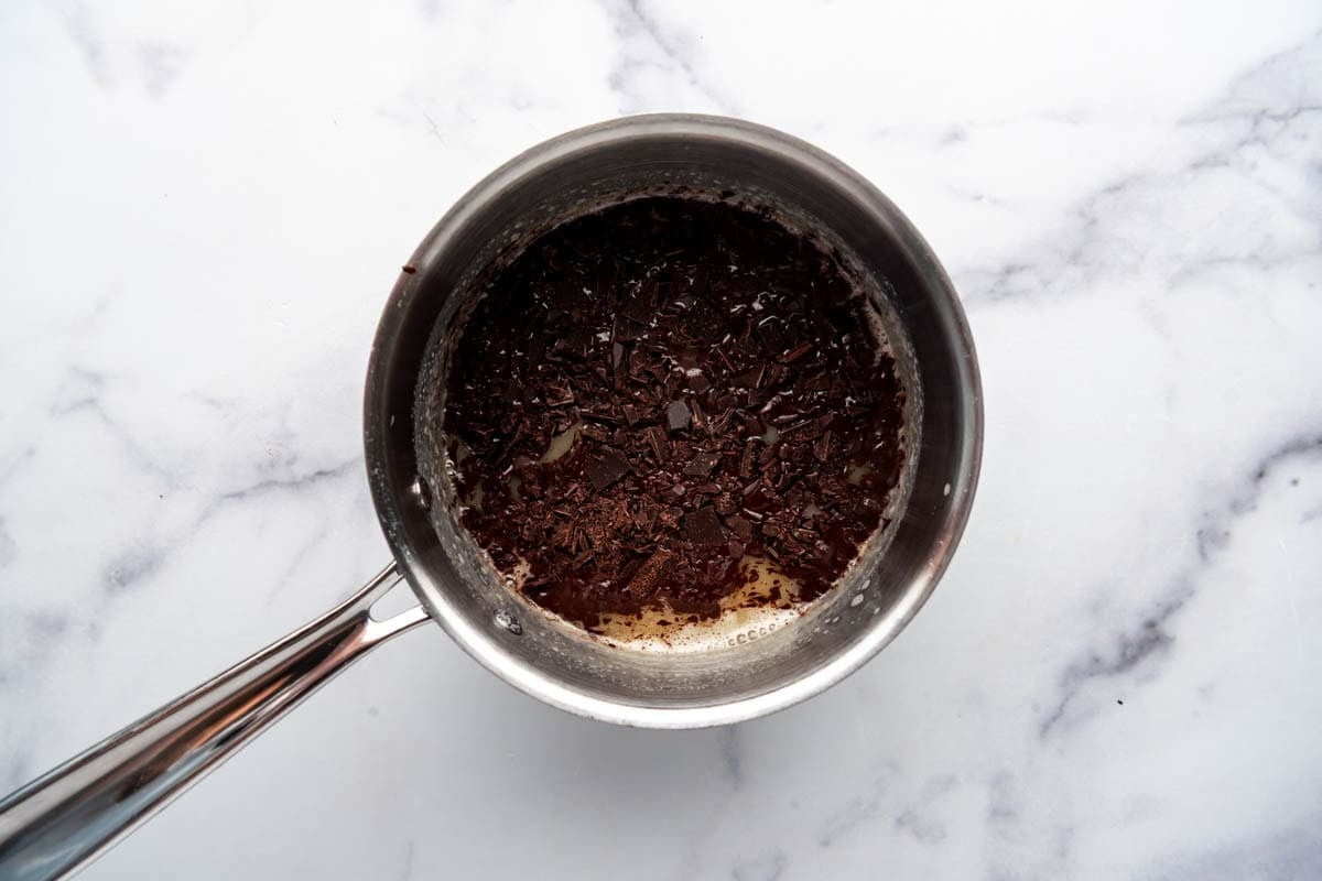 An overhead image of fudge icing in a pan.