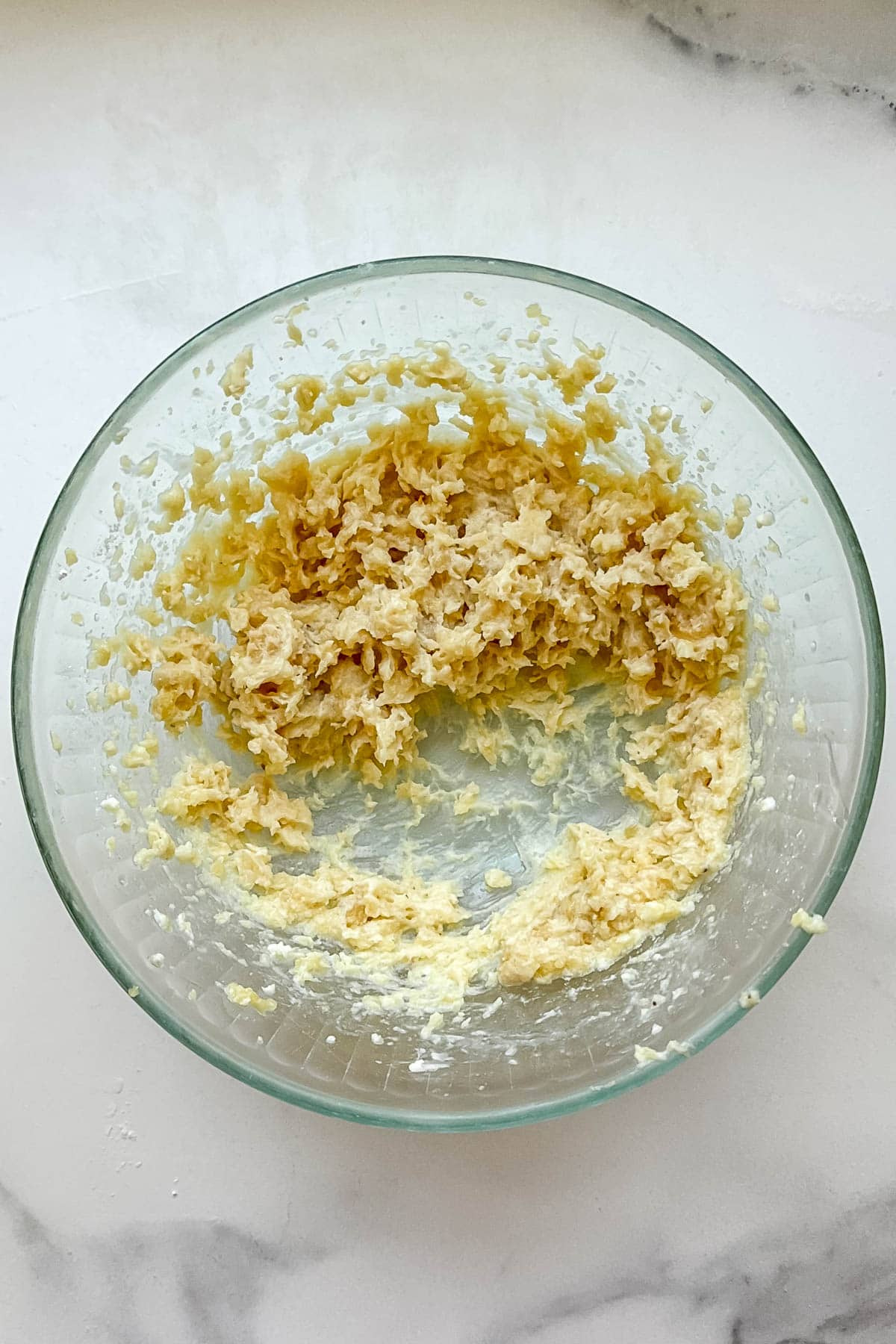 Almond filling in a glass mixing bowl.