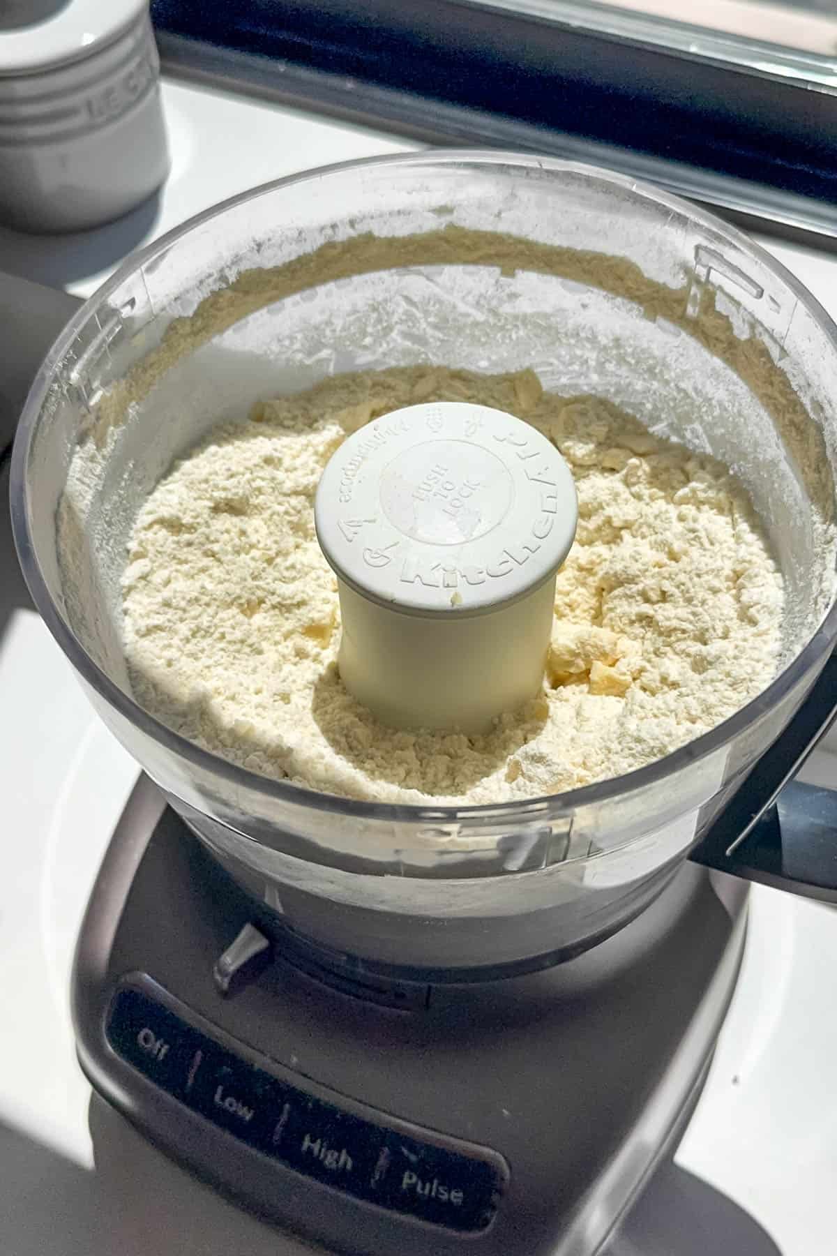 Butter and flour that have been pulsed together in a food processor until the butter is pea-sized.
