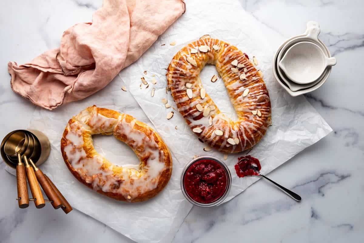 A horizontal image of two homemade danish kringle like the ones from O&H bakery in Racine, Wisconsin.