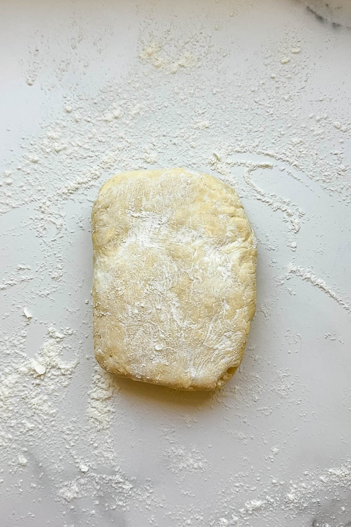 Kringle pastry dough on a floured surface.