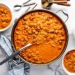 A pan of homemade spaghettios with meatballs.