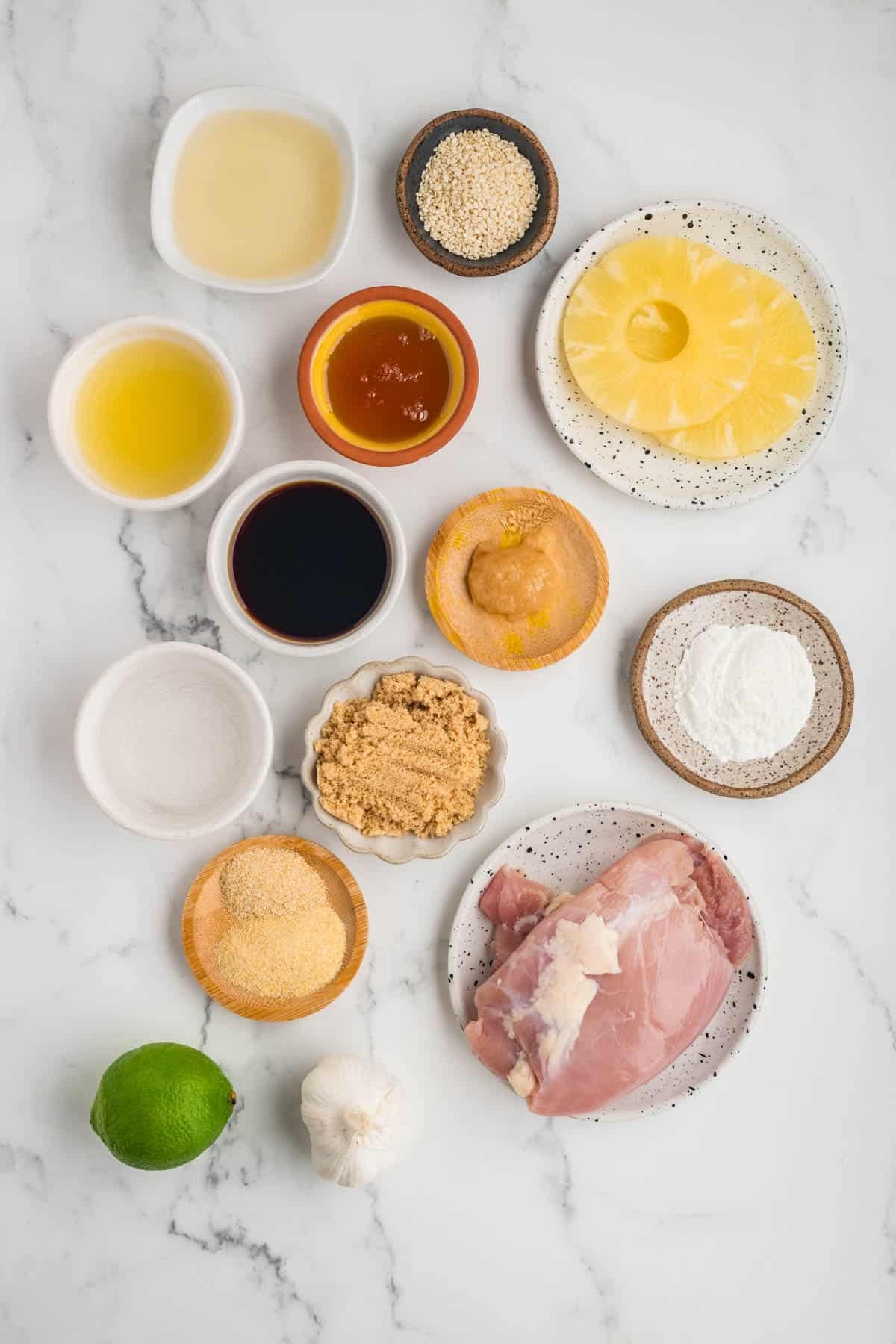 Ingredients for making baked pineapple teriyaki chicken.