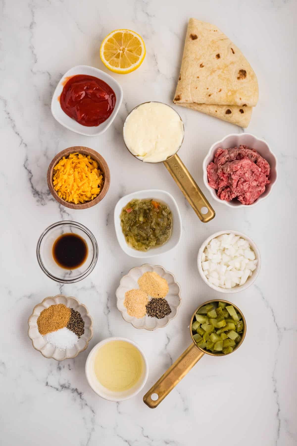 Ingredients for making cheeseburger quesadillas.