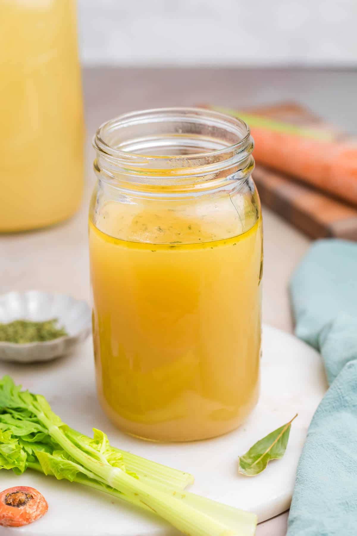 A jar of homemade chicken broth.