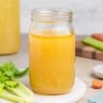 An image of a bottle of homemade chicken broth.
