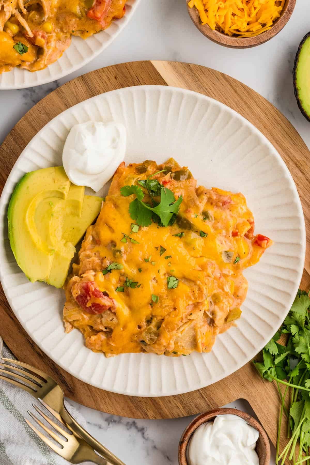 An overhead image of a plate of king ranch chicken.