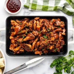 An overhead image of a serving plate of slow cooker bbq country style ribs.